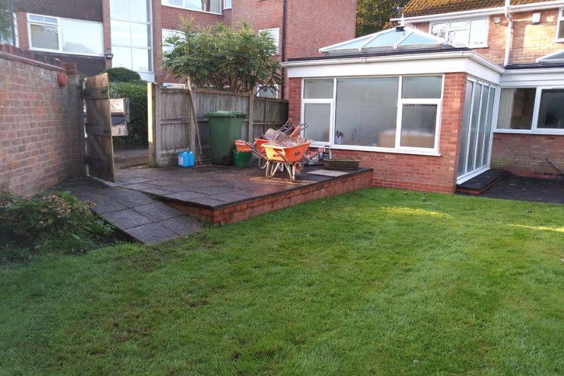 Landscaping works in Solihull. Raised patio area before works in garden.