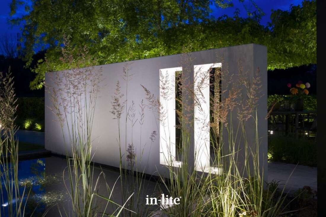 Contemporary design garden with outdoor spaces illuminated by integrated low voltage outdoor LED lighting by in-lite.