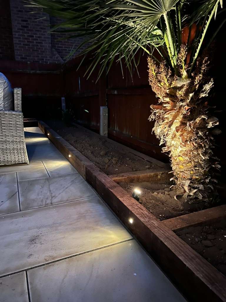 Safe low voltage, high quality 12v outdoor lights downlighting and accent lighting planting beds and patio borders in garden renovation project in heathcote, warwick - Oakland Group.