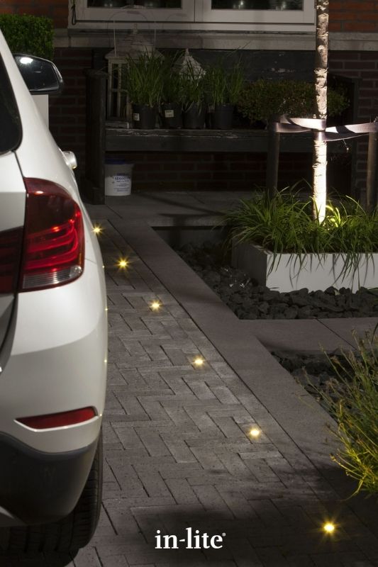 in-lite DB-LED 12v outdoor decking lights, recessed in pavers for indicative lighting along driveway border. Low voltage outdoor garden lights, atmospheric lighting for ambiance.