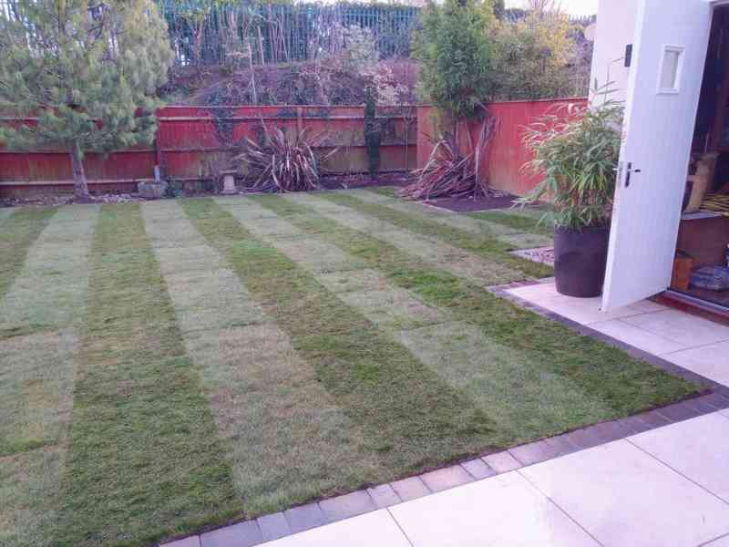 Landscape garden makeover new turf and porcelain patio landscaping in Stratford upon Avon, Warwickshire - Oakland Group.