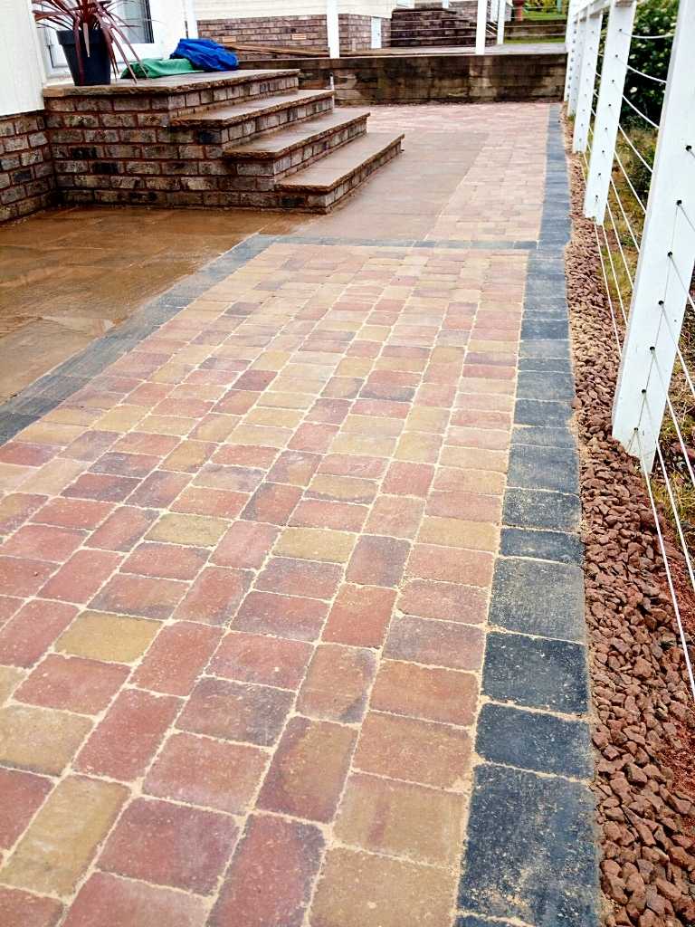 Domestic landscape garden transformation, patio installed with decorative gravel, block paving and slabbing works at Broadwell Woods Residential Park in Burton Green, Kenilworth - Oakland Group.