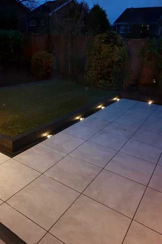 Safe Low Voltage Outdoor Lighting recessed in paving to create indicative lighting effects.