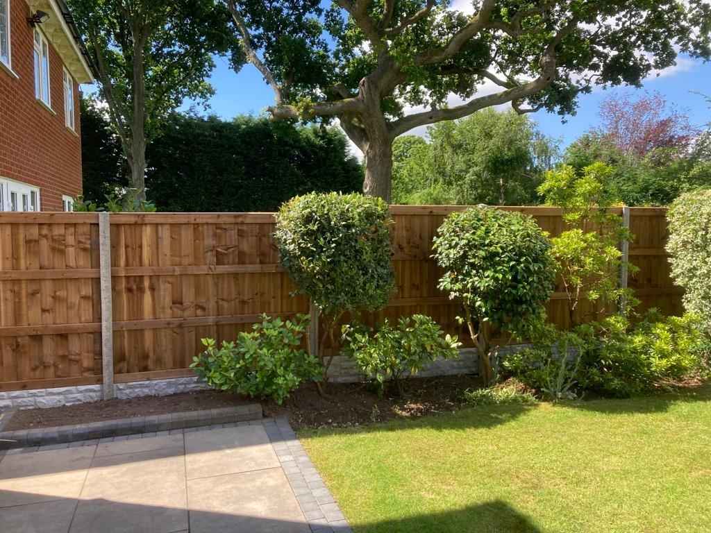 New garden perimeter fencing complete with fence panels, concrete posts and gravel boards, supplied and fitted by landscape installation team in Damson Parkway, Solihull - Oakland Group.