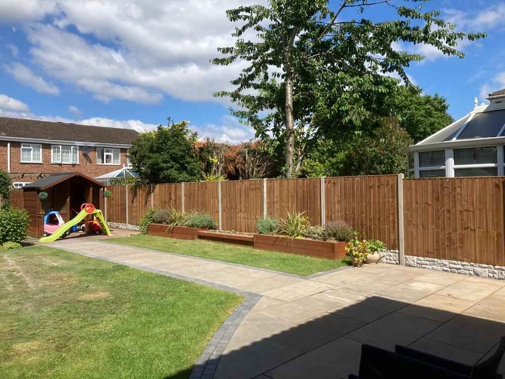New garden fencing complete with fence panels, concrete posts and gravel boards, supplied and fitted by landscape installation team in Damson Parkway, Solihull - Oakland Group.