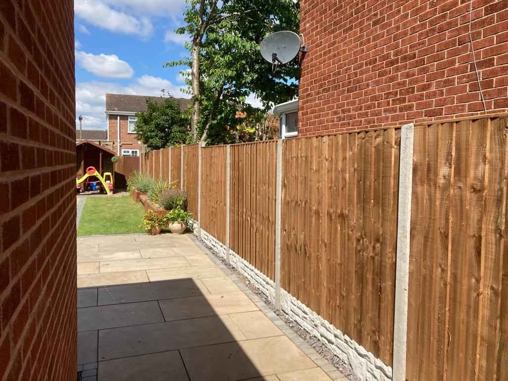 New garden fencing complete with fence panels, concrete posts and gravel boards, supplied and fitted by landscape installation team in Damson Parkway, Solihull - Oakland Group.