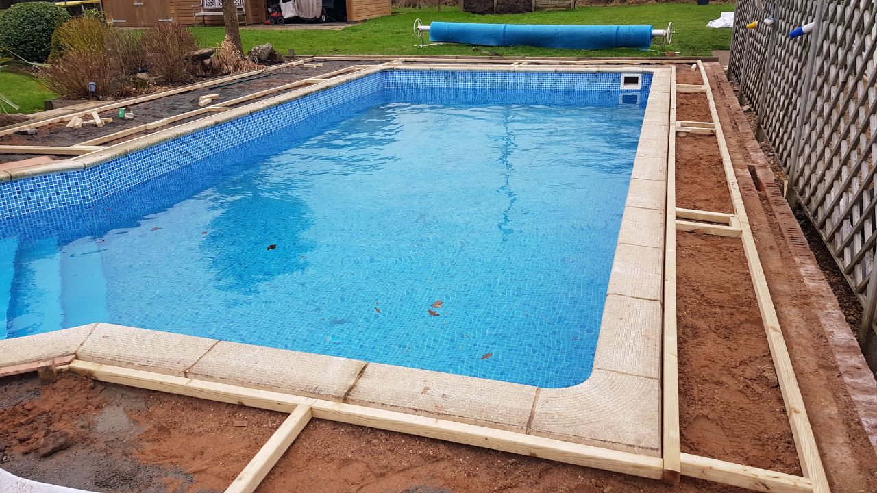 Landscaping works in progress in Rowington Warwick. Ground preparation works around swimming pool in private residence.