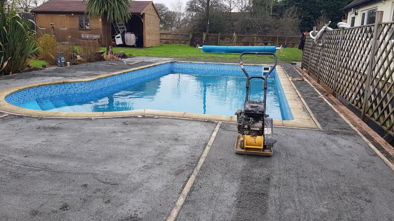 Landscaping works in progress in Rowington Warwick. Ground preparation works around swimming pool in private residence.