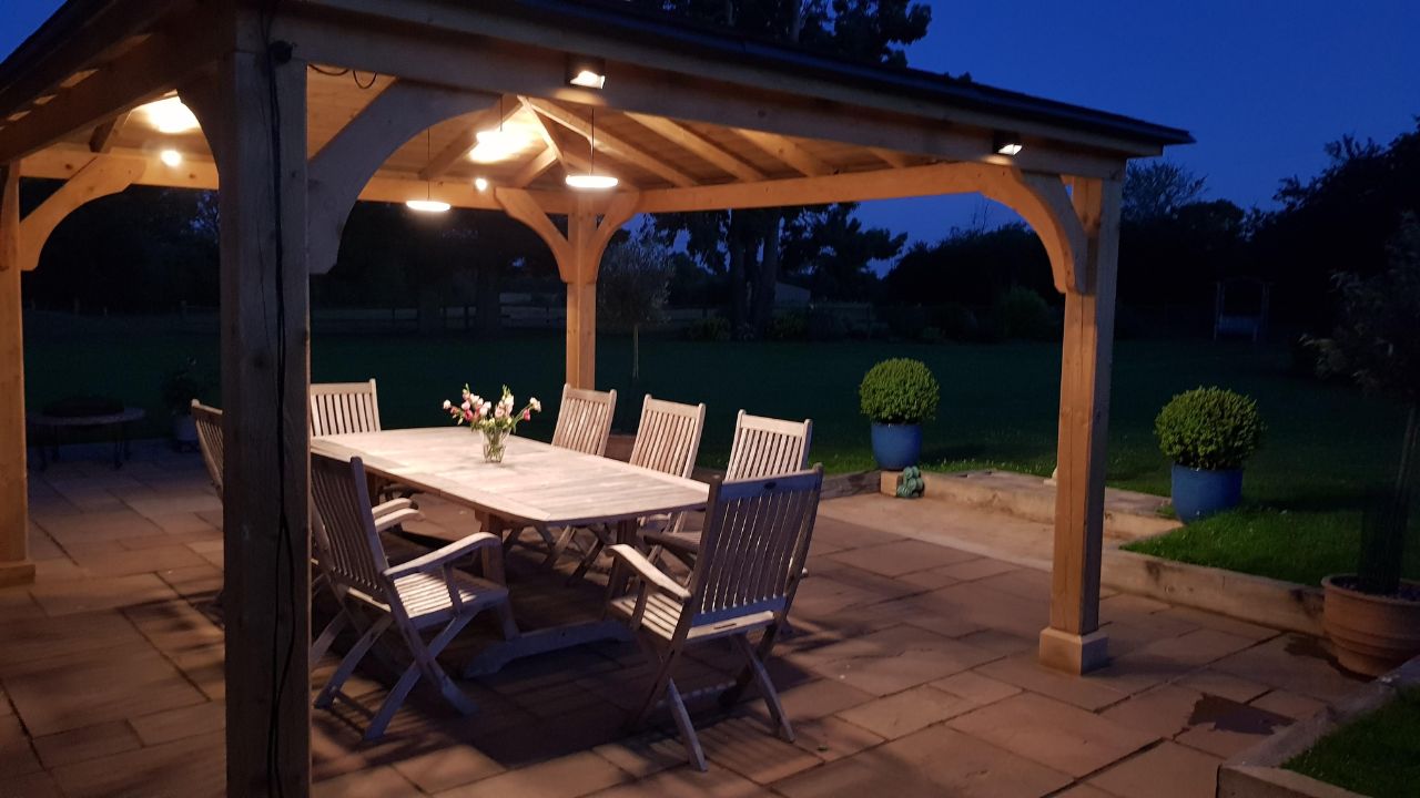 Landscaping works completed in Rowington Warwick. Imperial gazebo with low voltage outdoor lighting installed in private garden residence.