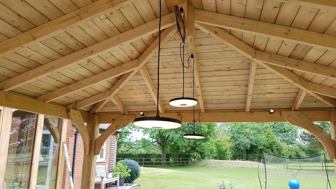 Landscaping works in progress in Rowington Warwick. Gazebo lighting. in-lite 12v outdoor spotlights mounted in place on timber. in-lite 12v outdoor pendant lights hanging in place.