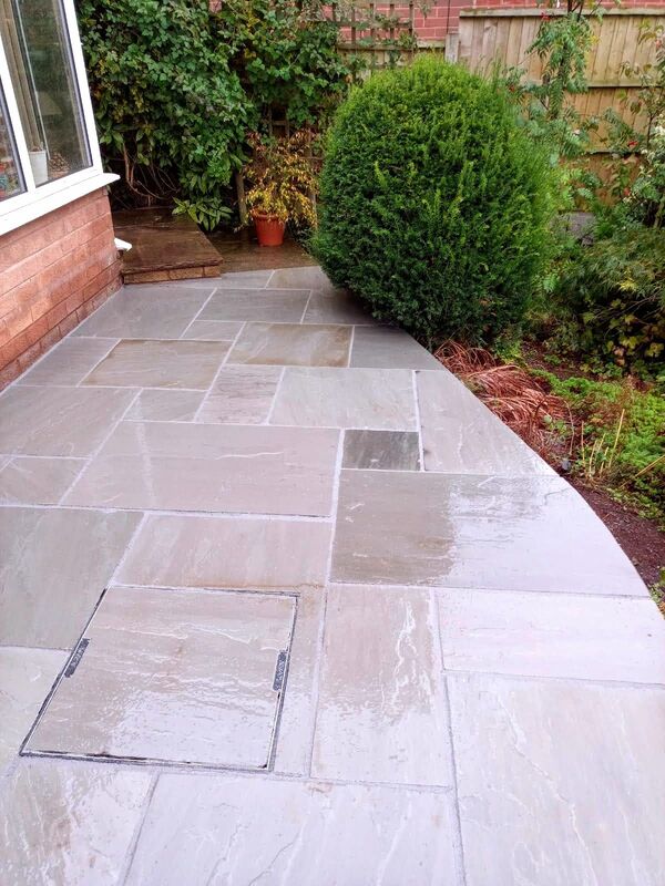 Landscaping works completed in Solihull. New patio laid with natural stone paving.