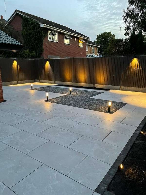 Porcelain patio and selection of low voltage garden lights for evening lighting in Dorridge, Solihull - Oakland Group.
