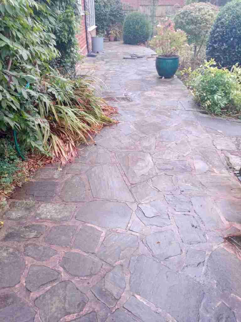 Old garden paving before patio works in Solihull - Oakland Group.