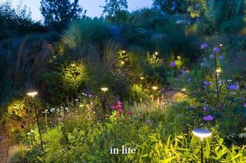 in-lite SWAY and SWAY LOW outdoor bollard lights, atmospheric lighting effects in mature garden.